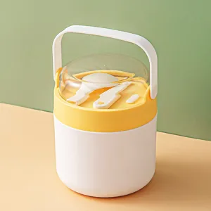 Fiambrera térmica portátil taza de sopa con asa y cuchara diseño blanco y amarillo.