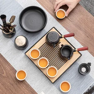 Set da tè kung fu in ceramica cinese teiera con manico laterale vassoio in legno