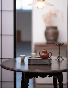 Vintage pewter tea tray and kung fu tea set detail showcasing traditional Chinese tea culture.