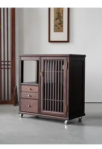 Walnut wood mobile tea cart detail, solid wood tea cabinet with wheels and slatted doors.