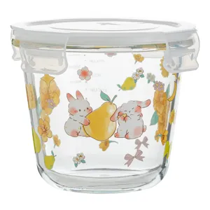 Boîte de conservation en verre transparent avec motif lapin, couvercle et graduation.