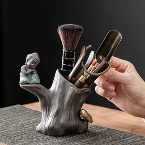 Set di strumenti per tè in ceramica retrò con supporto tronco d'albero e monaco