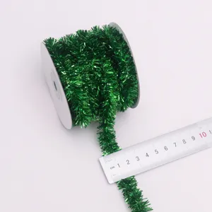 Green metallic tinsel garland with iron wire for Christmas tree and holiday party decoration.