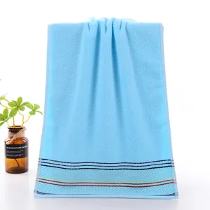 Premium pure cotton blue face towel with elegant stripe border for daily home use soft and absorbent.
