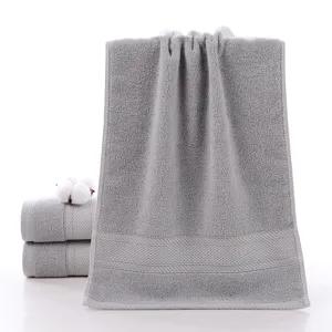 Grey pure cotton face towel soft absorbent daily bath towel for home bathroom use.