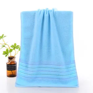 Soft pure cotton blue face towel for daily home use, comfortable and highly absorbent.