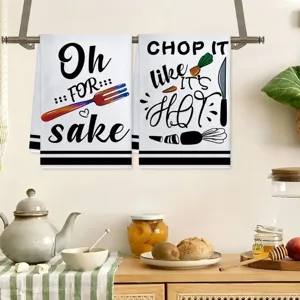 Creative kitchen towels set featuring funny typography and baking motifs, highly absorbent fabric.
