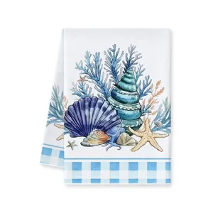 Ocean themed microfiber dish towel with seashell and starfish watercolor print for kitchen use.