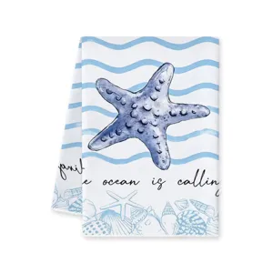Microfiber kitchen dish towel featuring starfish and shell ocean print folded main view