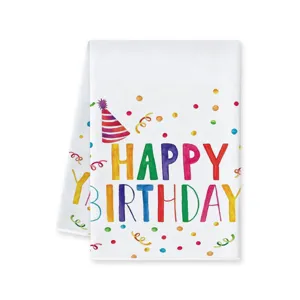 Dettaglio dell'asciugamano da cucina buon compleanno con testo acquerello e coriandoli colorati.
