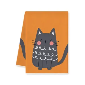 Primer plano detallado de un suave paño de cocina de microfibra con lindo gato gris.