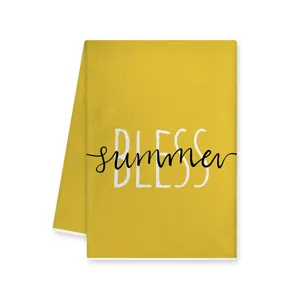 Yellow kitchen towel detail view featuring summer bless print and clean soft fabric.