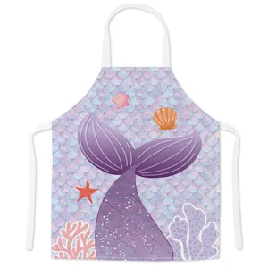 Cute mermaid print kitchen apron for cooking, fantasy fish scale design with adjustable strap.