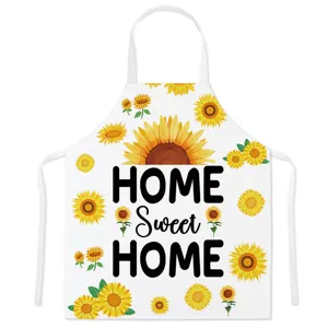 Sunflower kitchen apron with cute floral print and text, perfect for cooking and baking.