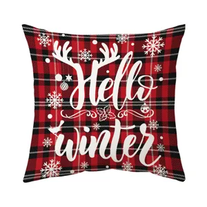 Close-up detail of the red and black buffalo plaid Christmas pillow cover with Hello Winter text.