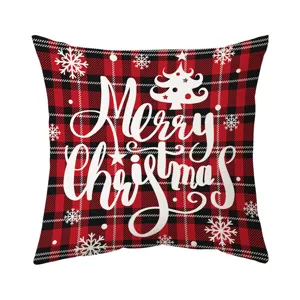 Christmas red buffalo plaid throw pillow cover featuring white snowflakes and holiday tree.