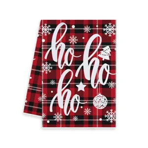 Kerst rood zwart geruite keukendoek met mooie sneeuwvlokken en feestelijke tekstprint.