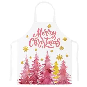 Christmas tree print kitchen apron with pink watercolor design for holiday cooking and baking.