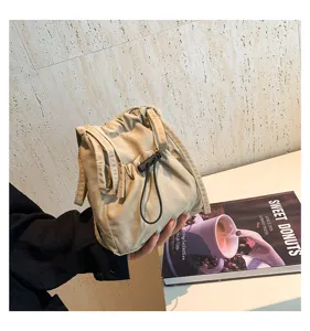 Casual nylon drawstring bucket bag minimalist solid color shoulder bag detail view