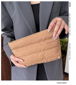 Khaki quilted clutch bag for women, stylish minimalist padded evening purse for daily commute.