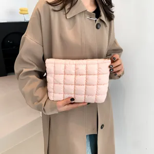 Chic pink quilted clutch bag, soft pleated design for women daily fashion and makeup storage.