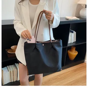 Casual minimalist commuting tote bag for women, lightweight stylish single shoulder underarm bag.