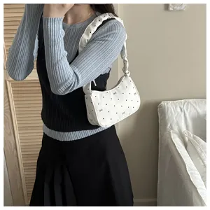 White pleated shoulder underarm bag with chic black dot and bow patterns, daily handbag.