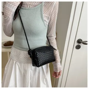 Black woven leather crossbody camera bag, stylish mini shoulder bag for women daily wear.