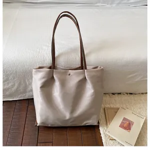 Casual minimalist commuting tote bag for women, lightweight single-shoulder underarm bag.