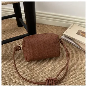 Brown woven leather crossbody camera bag, stylish chic shoulder bag with shoulder strap.