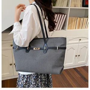 Elegant large-capacity women tote bag, versatile commuting shoulder bag with stylish lock detail.