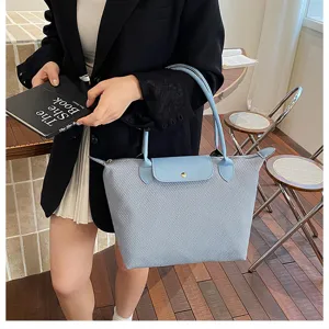 Classic nylon tote bag for women, elegant stylish shoulder handbag with leather flap for commute.