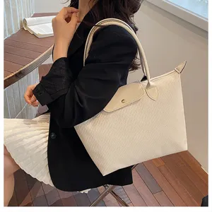 Classic beige folding tote bag for women, large capacity stylish shoulder commuting bag.
