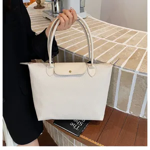 Classic beige tote bag for women, large capacity commuter handbag with top handle and snap.
