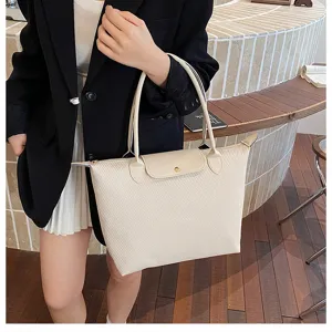 Beige tote bag for women, classic flap snap design, large capacity commuting handbag.