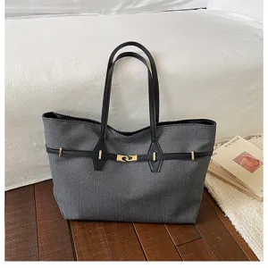 Retro denim tote bag for women, large capacity shoulder bag for casual commuting and daily use.