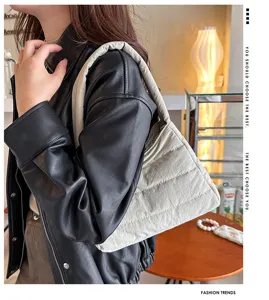 Fashion casual nylon shoulder bag for women, lightweight solid color quilted underarm puffer bag.