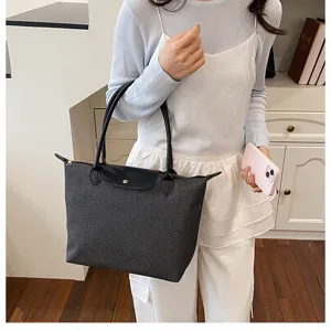 Classic textured tote bag for women, spacious shoulder handbag for daily commuting and office.