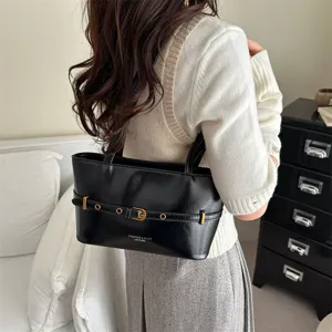 Korean fashion minimalist black leather shoulder bag with chic belt buckle design for daily wear.