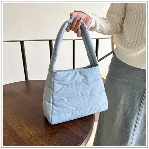 Casual light blue quilted nylon shoulder bag, lightweight underarm puffer bag for daily autumn wear.