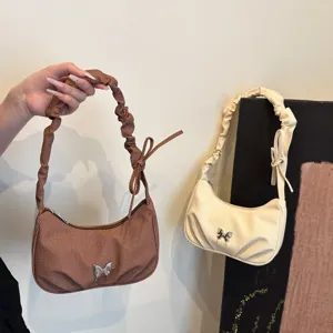 Chic pleated women shoulder bag, trendy niche design handbag with cute bow and silver butterfly.