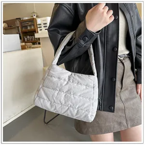 Minimalist casual solid color nylon shoulder bag, lightweight quilted underarm bag for women.