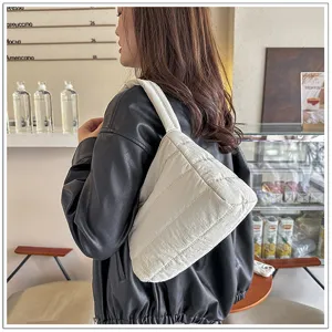 Lightweight quilted nylon underarm shoulder bag for women, casual minimalist hobo handbag.