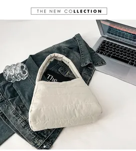 Minimalist quilted nylon shoulder bag for women, lightweight casual underarm bag detail view.