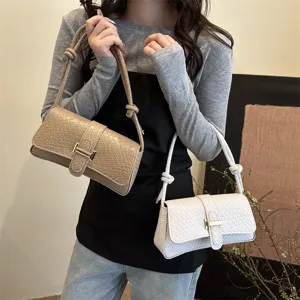 Elegante bolso de hombro con textura tejida para mujer, bolso baguette de moda con asa de nudo.