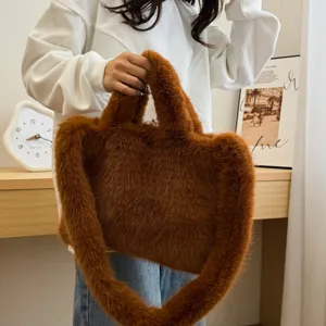 Brown fluffy plush handbag for women, casual fuzzy tote shoulder bag with soft texture detail.