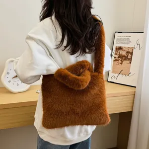 Cozy brown plush shoulder bag detail showing soft fluffy texture and autumn style.