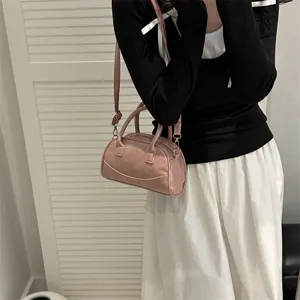 Stylish pink boston handbag and crossbody bag for women, chic daily casual shoulder purse.