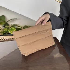 Minimalist quilted clutch bag, stylish padded evening purse for women daily commute.