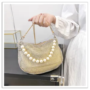 Elegant rhinestone evening handbag with pearl handle and chain strap for women party dress.
